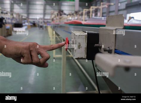 Male Hand Pushing Emergency Red Stop Button Stock Photo Alamy