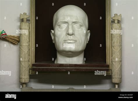 Tomb of Italian Fascist dictator Benito Mussolini in the Mussolini family crypt in the cemetery ...