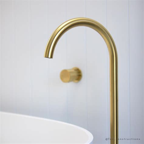 Oscar Floor Mounted Bath Filler Brushed Brass Abi Bathrooms And Interiors