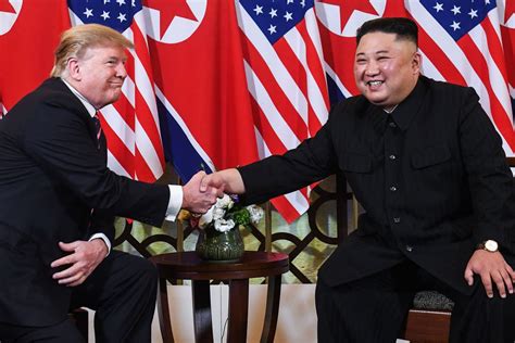 Smiling Trump greets Kim Jong-un with handshake at second summit in ...