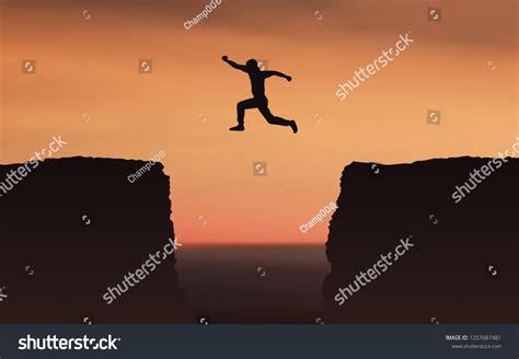 Silhouette Man Jumping Over Gap Between Shutterstock