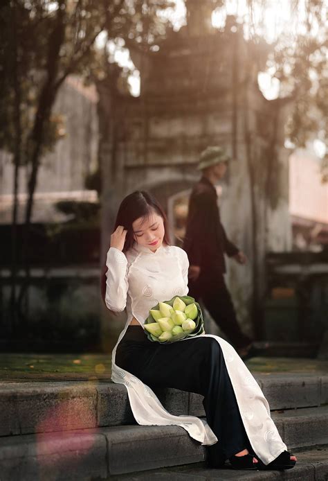 Vietnamese Traditional Custom With National Flower Lotus Áo Dài