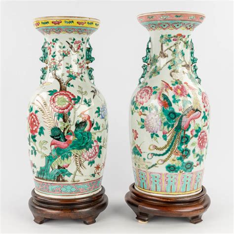 A Set Of 2 Chinese Famille Rose Vases Decorated With Phoenixes And Peacocks 19th20th C