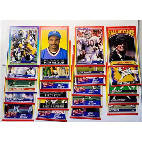 15) LOT OF 22 SCORE 1990 NFL TRADING CARDS.