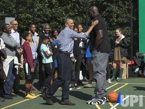 Photo President Barack Obama Greets Shaquille Oneal At The White