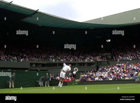 Wimbledon Champion In 1999 American Pete Sampras As He Serves Against