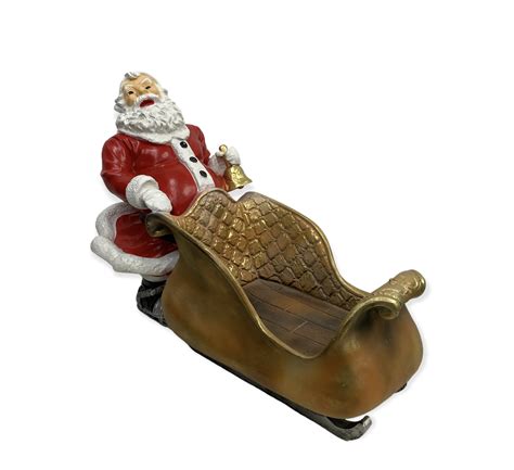 Statue Père Noël Patineur Résine H 50CM Prestige House boutique de