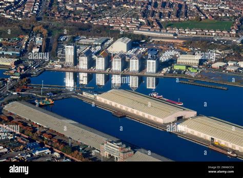 New Buildings Reflected In Birkenhead Dock Shot From The Air River