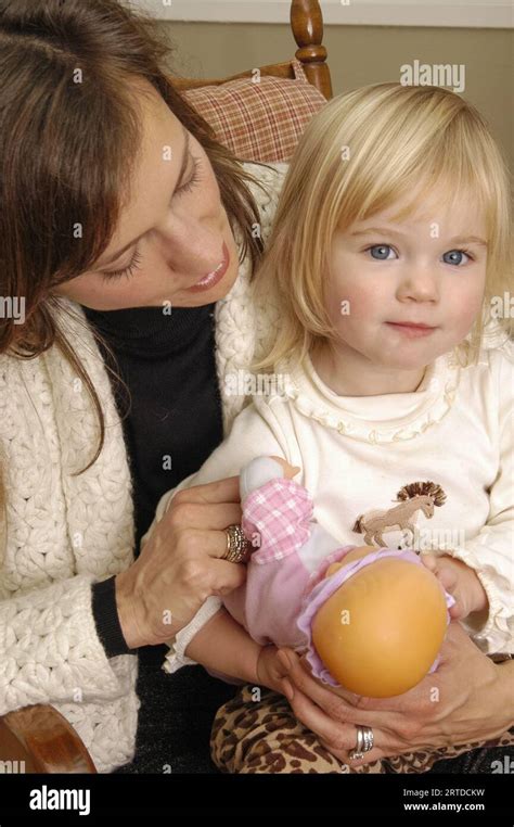 Mom and daughter playtime Stock Photo - Alamy