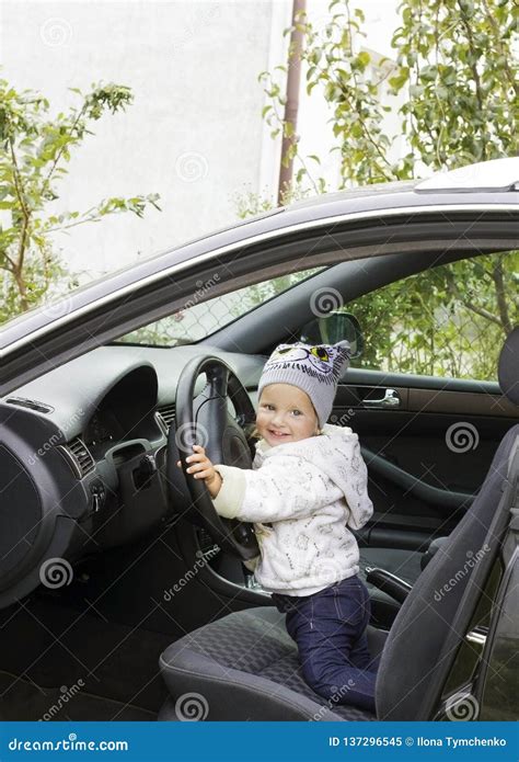 Cute Little Girl Driving Car Stock Image - Image of little, curious: 137296545