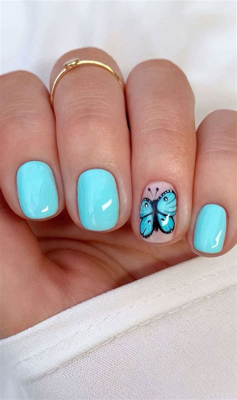 Summer Nail Designs Youll Probably Want To Wear Bright Blue And Butterfly Nails