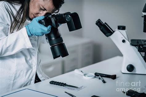 Forensics Expert Examining Crime Scene Evidence Photograph By Microgen Images Science Photo