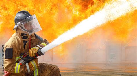 Firemanfirefighter Training Firefighters Using Water And Fire