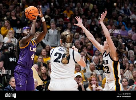 Lsus Flaujae Johnson Shoots Past Iowas Caitlin Clark And Kate Martin