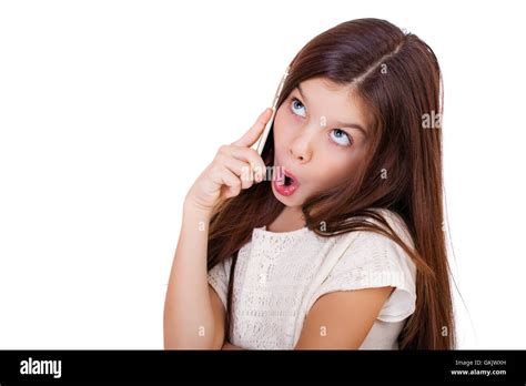 Portrait Of Brunette Caucasian Schoolgirl Calling By Phone Isolated On