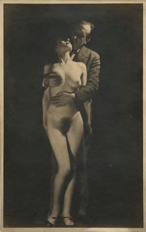 French Surrealist Poet Paul Éluard Hugging A Naked Woman In His Arms