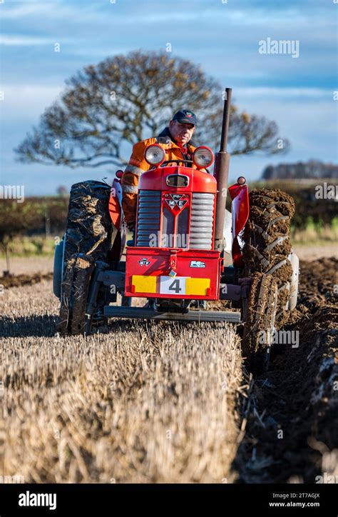 Vintage Massey Ferguson Tractor Ploughing Furrows In Ploughing Match East Lothian Scotland Uk