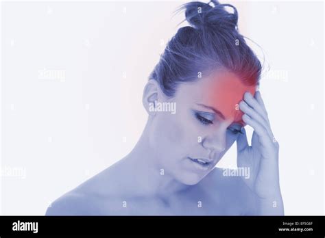 Woman with headache Stock Photo - Alamy