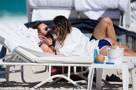 David Guetta Displays His Toned Abs With Bikini Clad Girlfriend Jessica