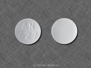 AN 627 Pill Images (White / Round)