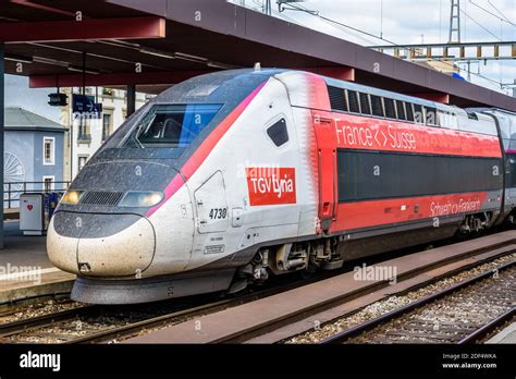 A Tgv Lyria Duplex High Speed Train In Its Livery Connecting