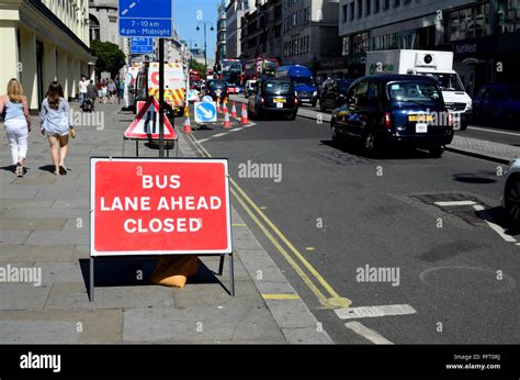 'Bus lane ahead closed' sign in the Strand, London, England, UK Stock ...