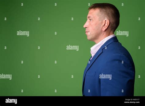 Profile View Of Mature Macho Businessman In Suit Stock Photo Alamy