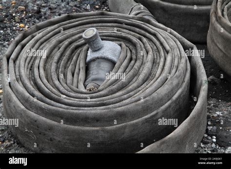 Fire Hose Coiled Hi Res Stock Photography And Images Alamy