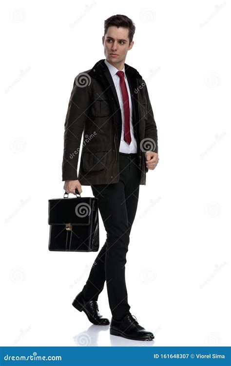 Serious Looking Businessman Holding His Briefcase Stock Image Image