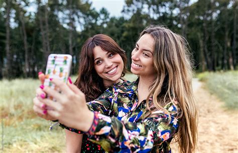 Two Women Outdoors By Stocksy Contributor Marco Govel Stocksy