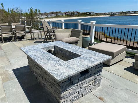 fire pit installed  white wave granite patio boston