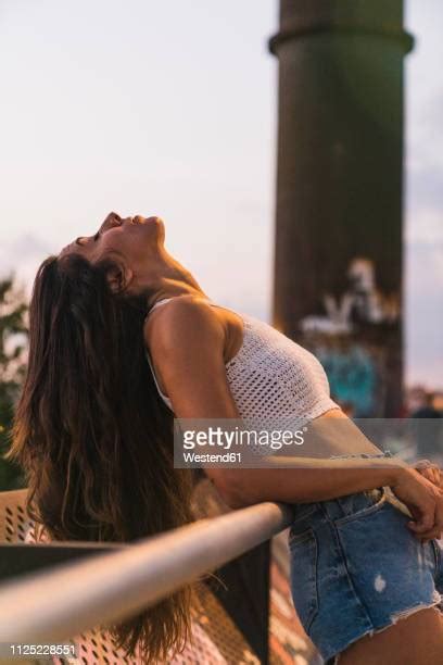 Woman Leaning Head Back Photos And Premium High Res Pictures Getty Images