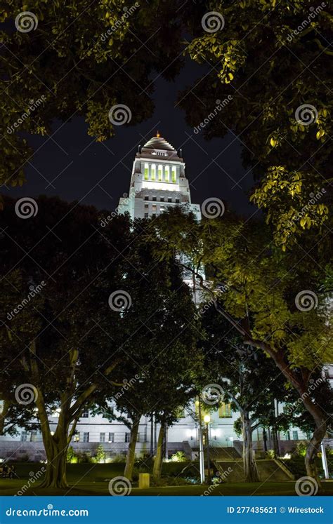 Iconic Los Angeles City Hall Illuminated at Night, with Lush Green ...