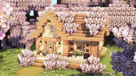 a large house surrounded by lots of purple flowers