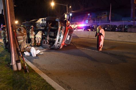 Tractor Trailer Overturns On Jersey City Street Photos