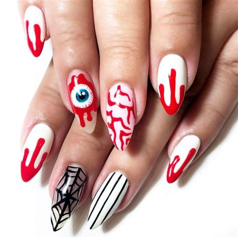 30 Spooky Halloween Nail Art Ideas Halloween Nails Major Mag