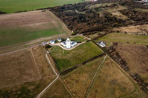 Premium Photo | Aerial view of the lighthouse at the white cliffs of dover