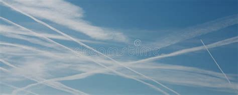 Condensation Trails Of Airliners In The Sky Stock Photo Image Of