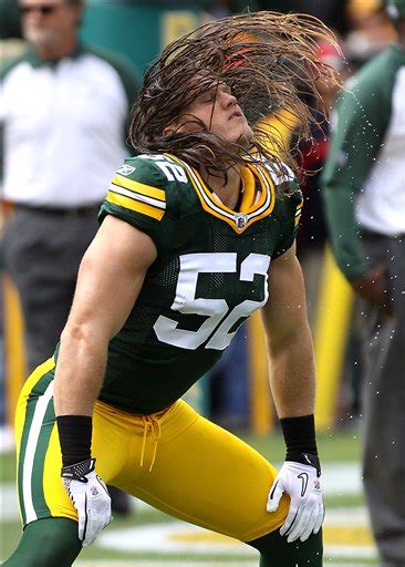 American Nfl Football Player Clay Matthews Flinging His Hair Around