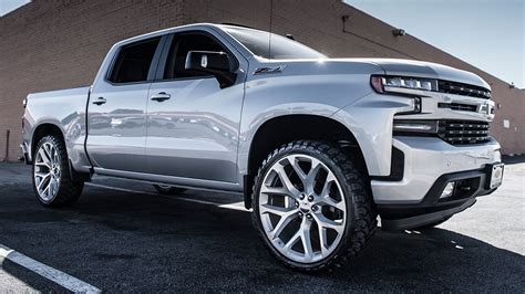 Chevrolet Silverado Snowflake Silver Wheels M T Tires Leveling