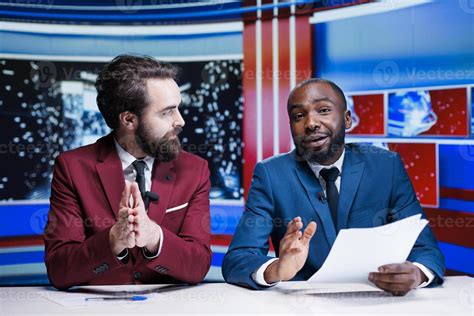 reporters team presenting news segment  television studio  host