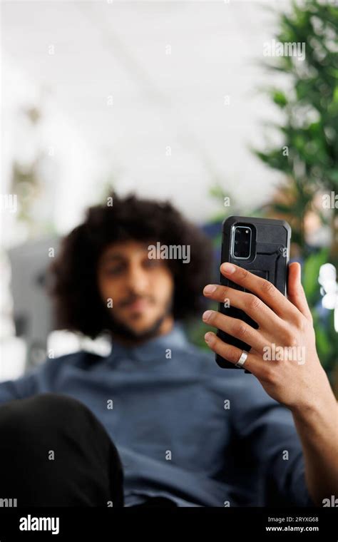 Business Company Employee Holding Smartphone While Chatting In