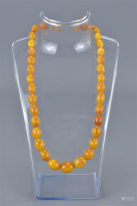 Bidlive Butterscotch Amber Necklace Containing Graduating Ovoid