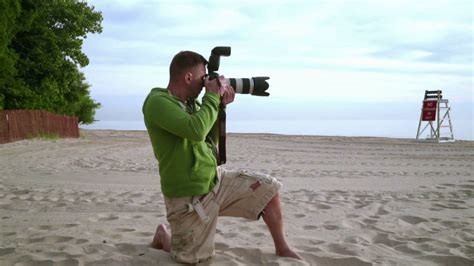 Photographer Takes Photo On Sea Beach Stock Footage SBV 310642340