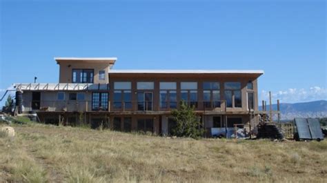 Passive And Active Solar Retrofit On A Traditional Adobe Green