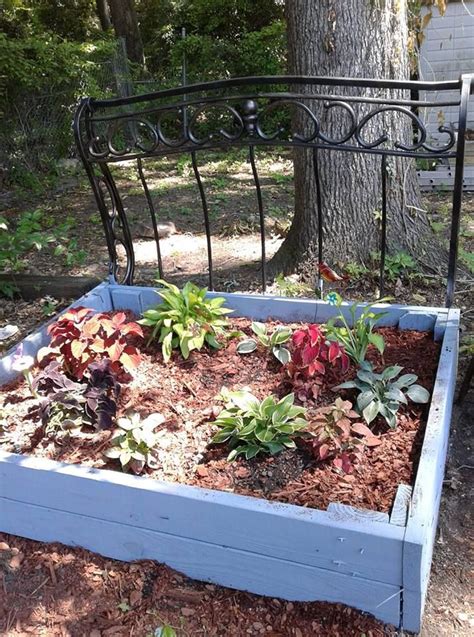 Mode This Flower Bed Using An Old Wrought Iron Head Board Love This Project Inside Bed Holds