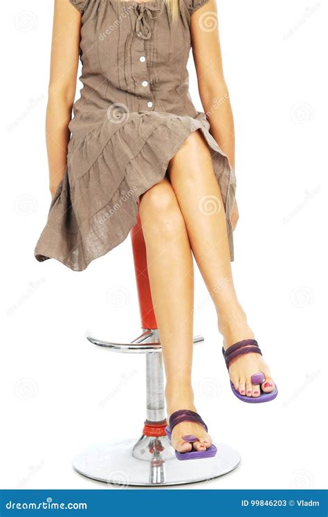 Beautiful Skin Women Sitting On The Bar Chair With Crossed Legs Stock