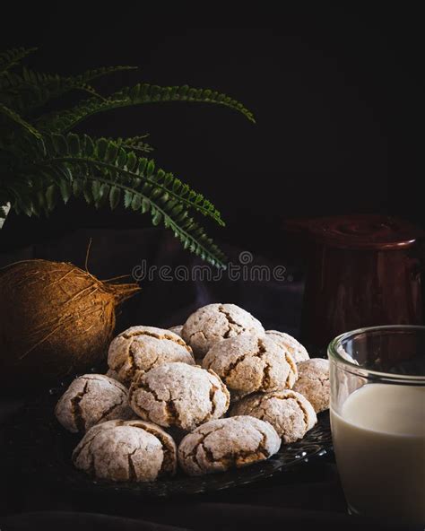 Tasty Christmas Crinkles Coconut And A Glass Of Milk With Dark Moody Background New Year