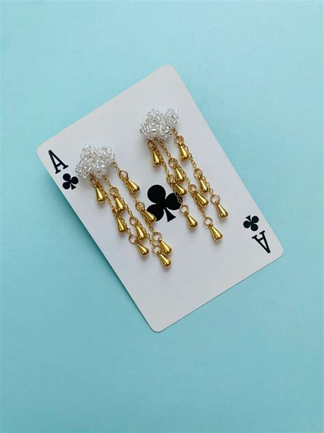 Seed bead cloud earrings with drop gold rain drops | Beaded jewelry