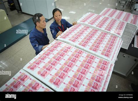 Chinese Workers Check Rmb Renminbi Yuan Notes On The Assembly Line At